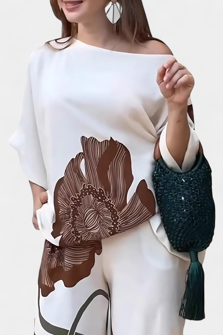 Jessie™ | Completo floreale con top asimmetrico e pantalone dritto