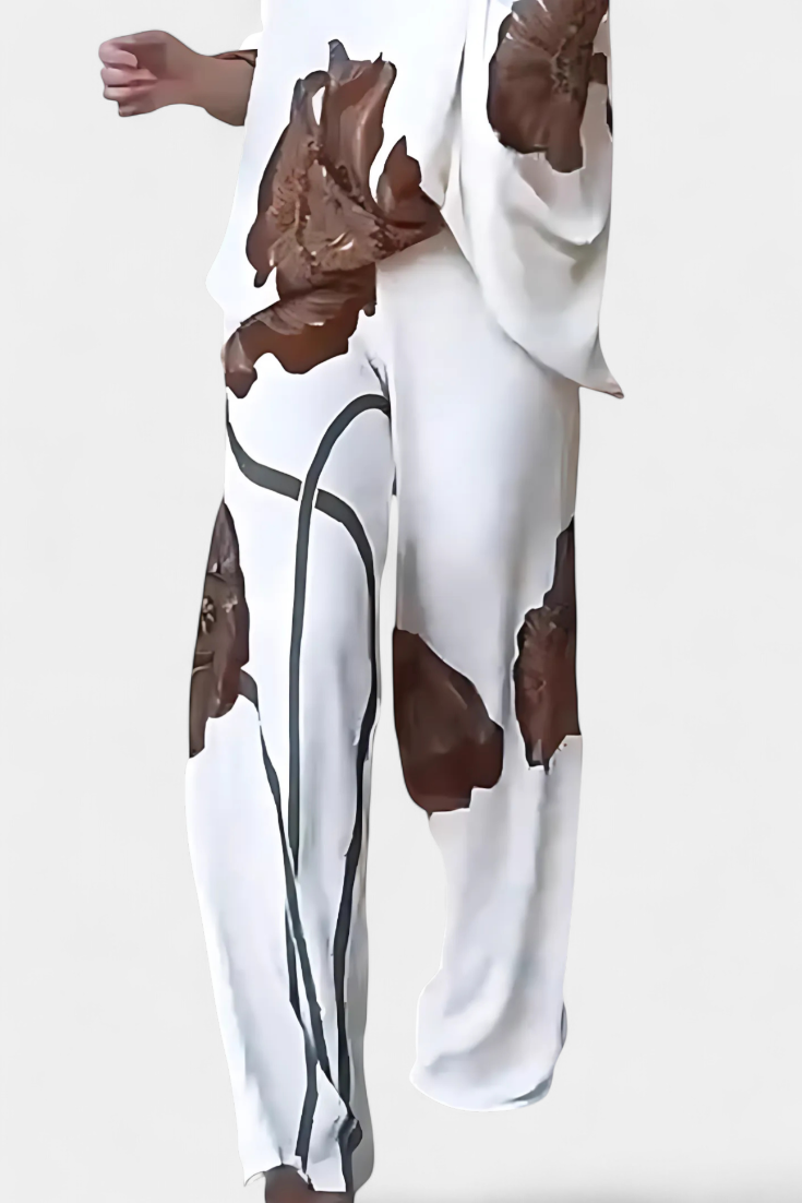 Jessie™ | Completo floreale con top asimmetrico e pantalone dritto