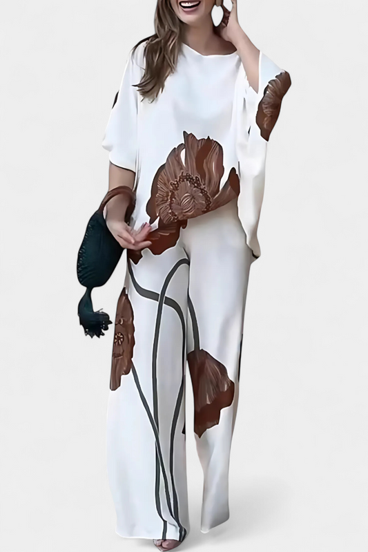 Jessie™ | Completo floreale con top asimmetrico e pantalone dritto