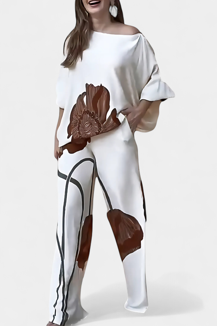 Jessie™ | Completo floreale con top asimmetrico e pantalone dritto